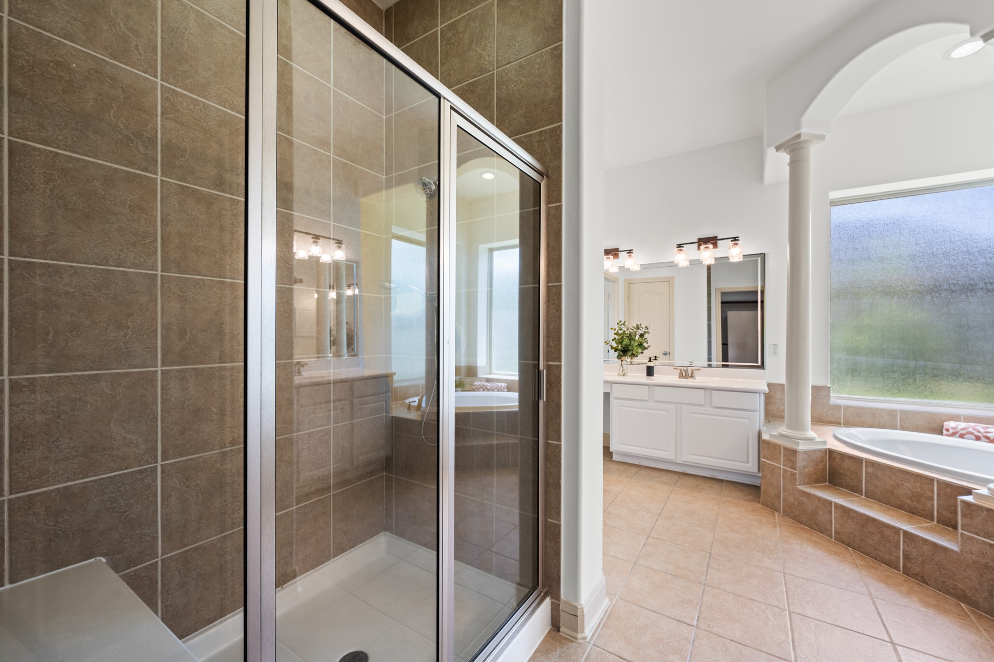 4603 Red Hawk Court Sugar Land, TX 77479 - Photo 25 of 50 a bathroom with a tub and shower