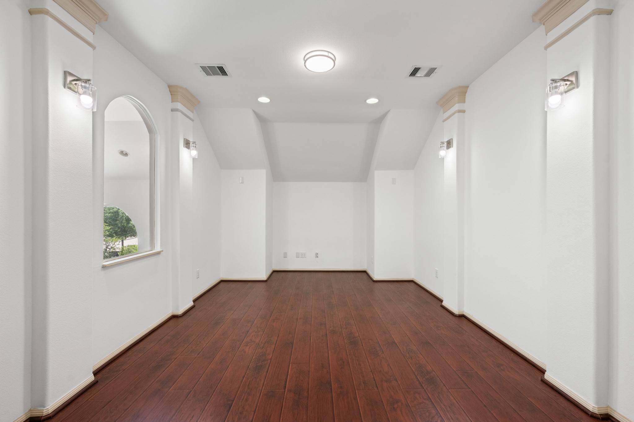 4603 Red Hawk Court Sugar Land, TX 77479 - Photo 32 of 50 an empty room with wooden floor and windows