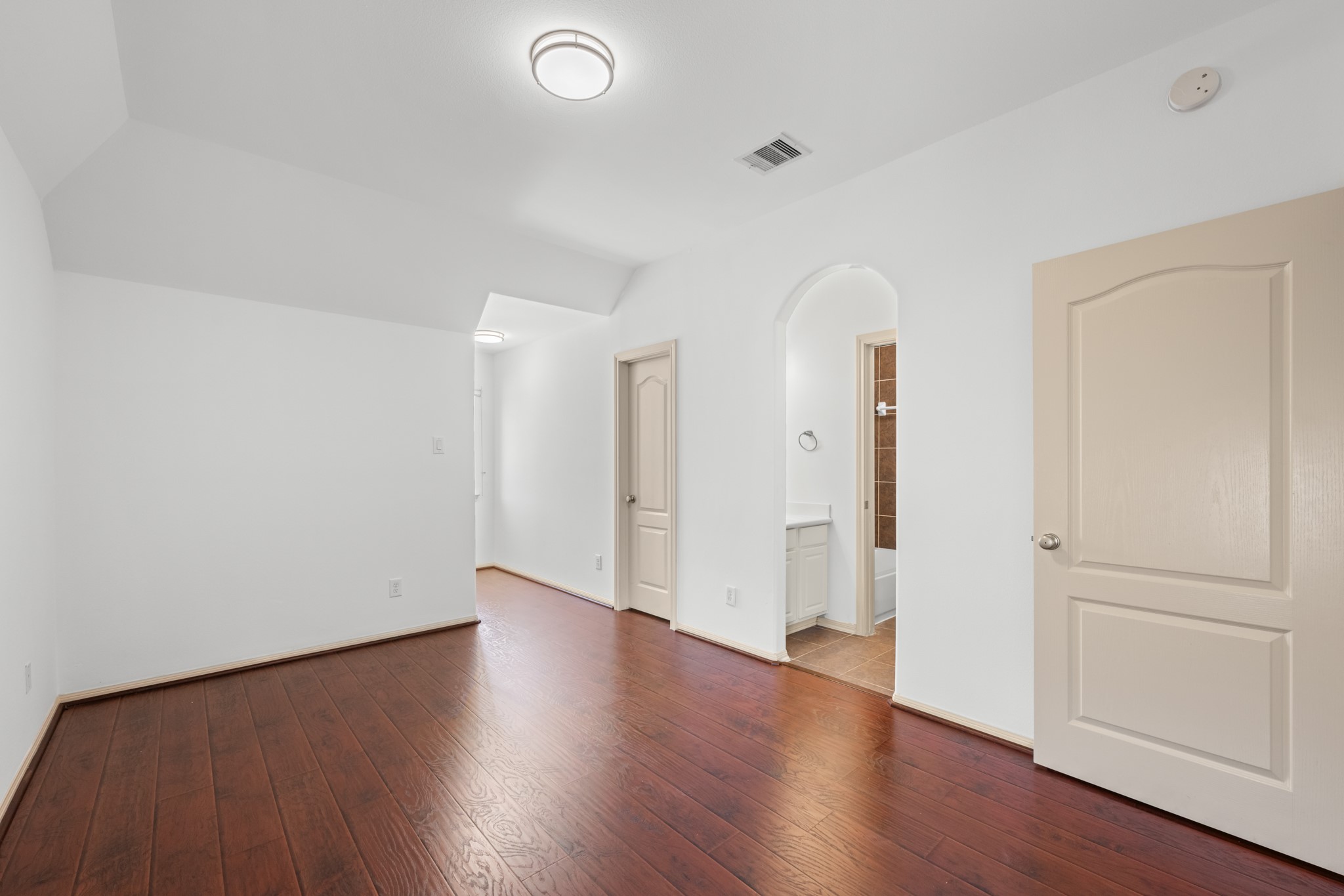 4603 Red Hawk Court Sugar Land, TX 77479 - Photo 37 of 50 an empty room with wooden floor and closet