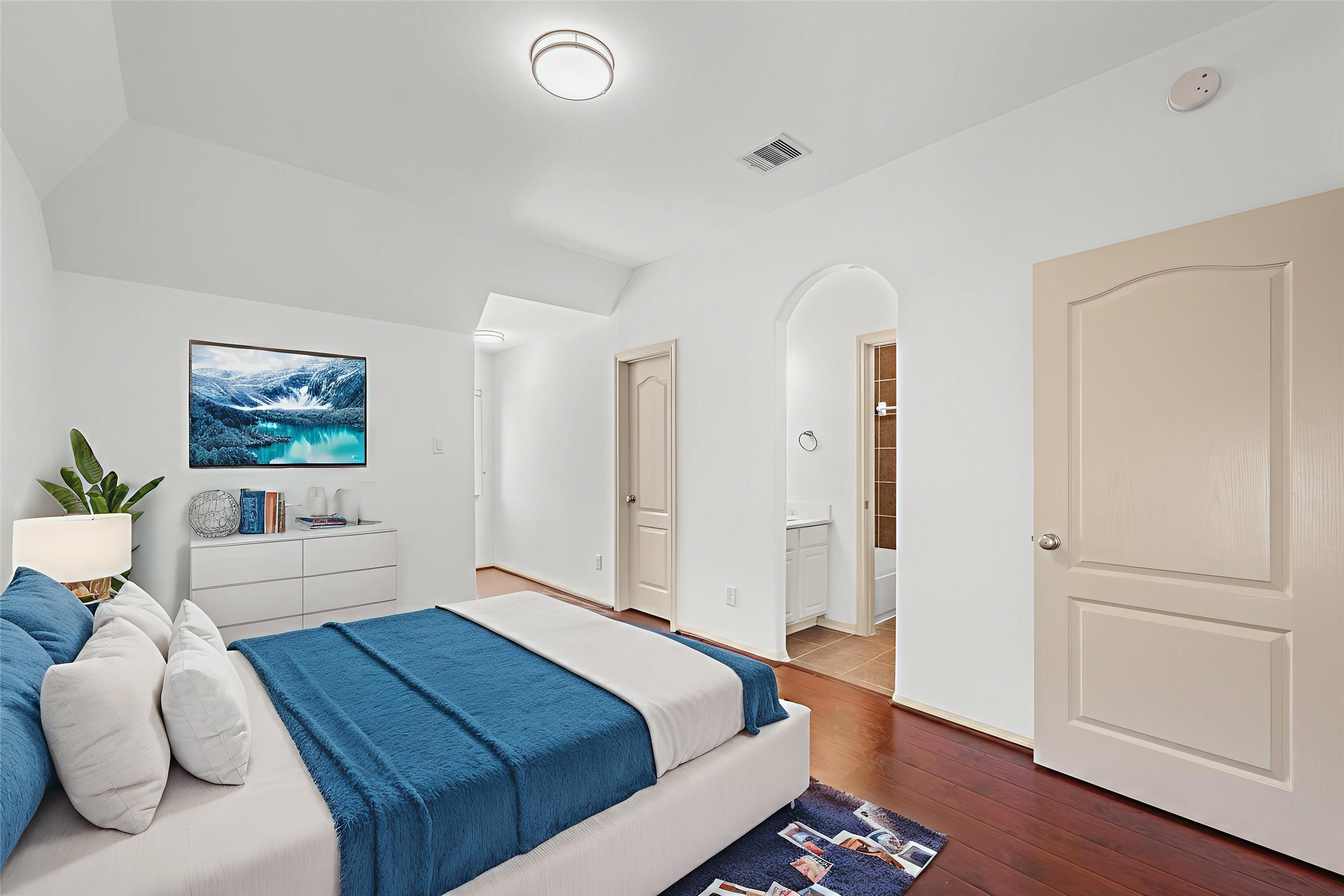 4603 Red Hawk Court Sugar Land, TX 77479 - Photo 38 of 50 a bedroom with a bed and a painting on the wall