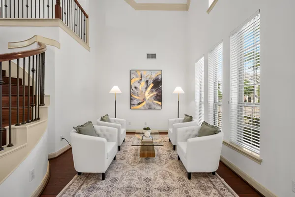 a living room with furniture and a window