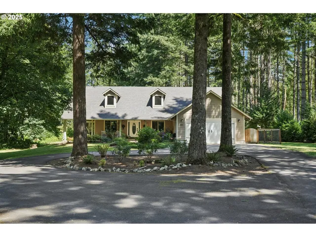 a sign board with buildings in the background