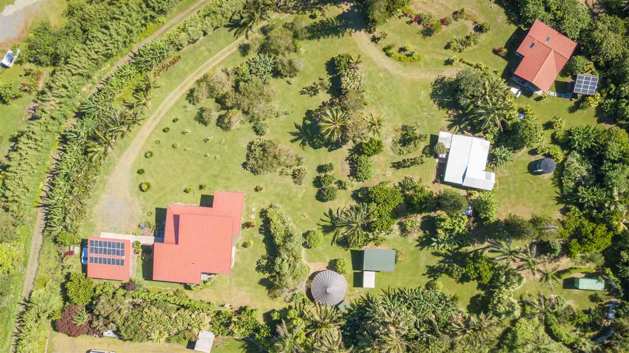525 North Honokala Road Haiku, HI 96708 - Photo 30 of 30 aerial view of a house with a yard and garden