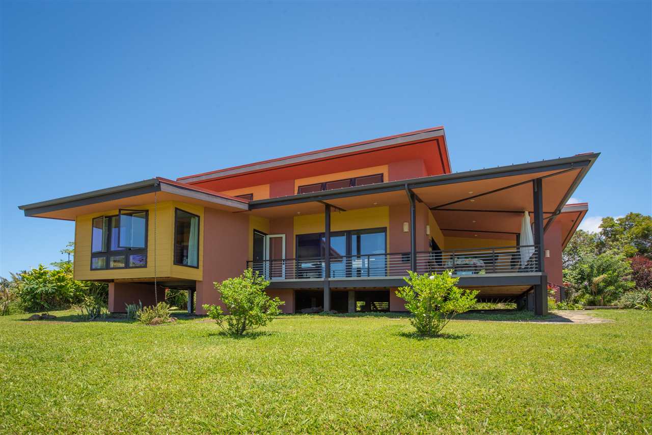 525 North Honokala Road Haiku, HI 96708 - Photo 3 of 30 a front view of a house with garden