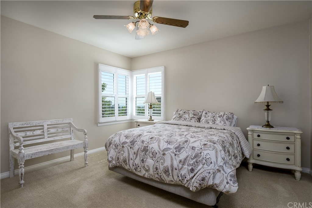 12430 Beverly Drive Whittier, CA 90601 - Photo 14 of 31 a bedroom with a bed and a window