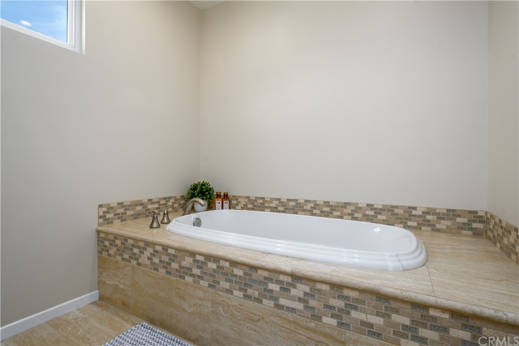 12430 Beverly Drive Whittier, CA 90601 - Photo 21 of 31 a bathroom with a bathtub