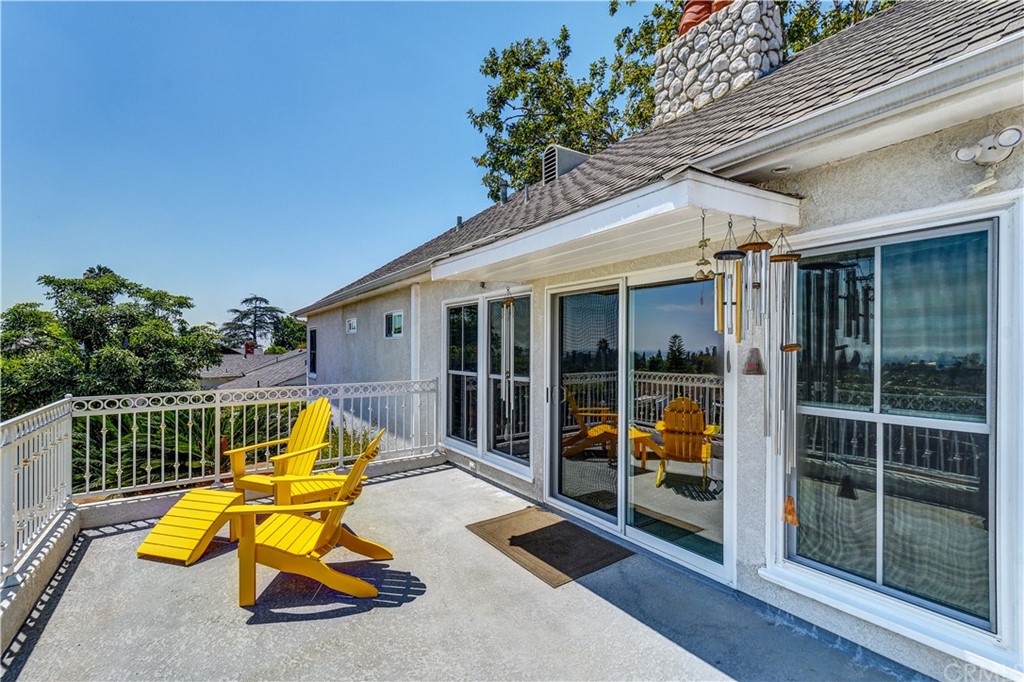 12430 Beverly Drive Whittier, CA 90601 - Photo 25 of 31 a view of a swimming pool with a lounge chair and front door
