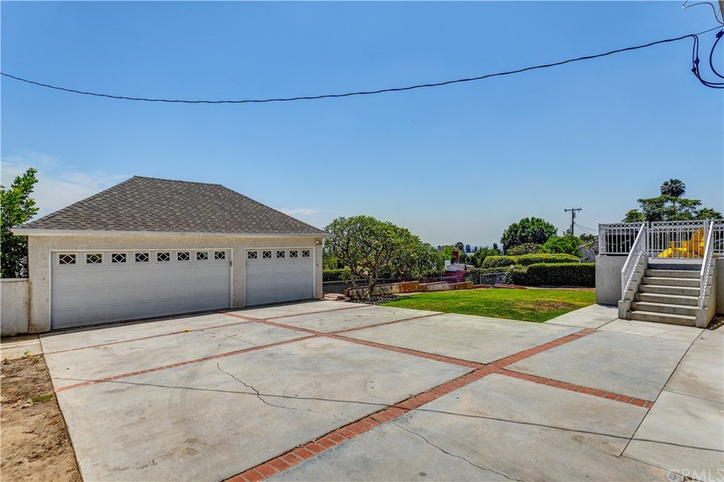 12430 Beverly Drive Whittier, CA 90601 - Photo 27 of 31 a view of a house with a yard