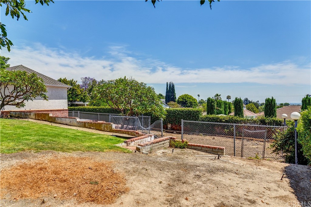 12430 Beverly Drive Whittier, CA 90601 - Photo 29 of 31 a view of a terrace with chairs
