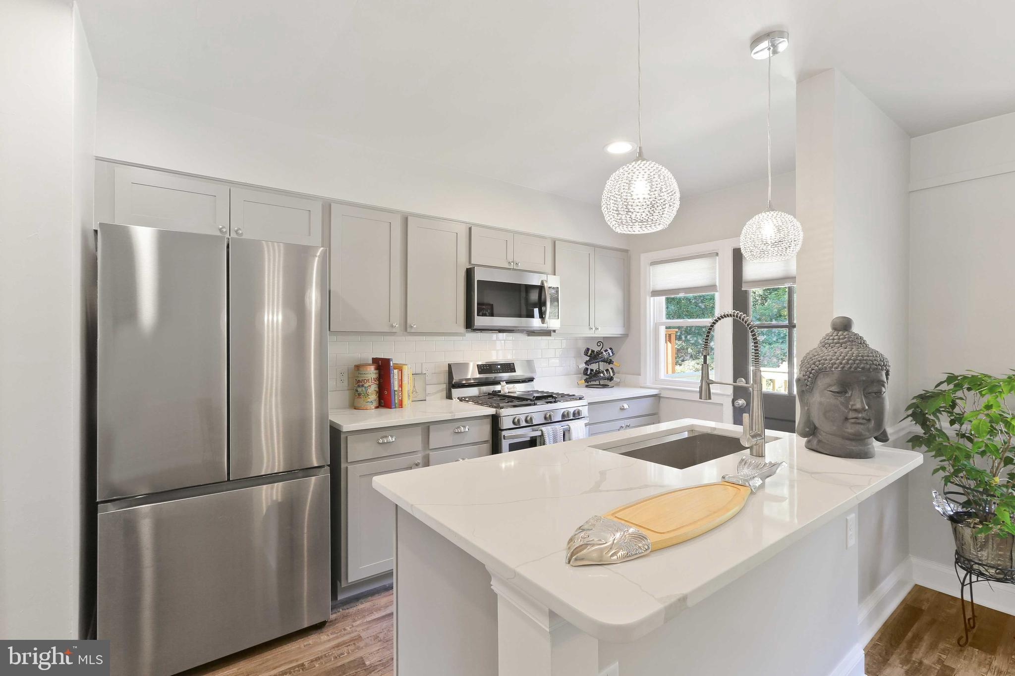 518 Random Road Baltimore, MD 21229 - Photo 15 of 56 Brand new kitchen, island and stainless