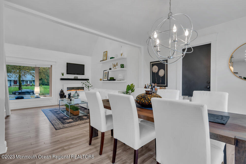8 Hillside Road Manalapan, NJ 07726 - Photo 21 of 59 a view of a dining room with furniture