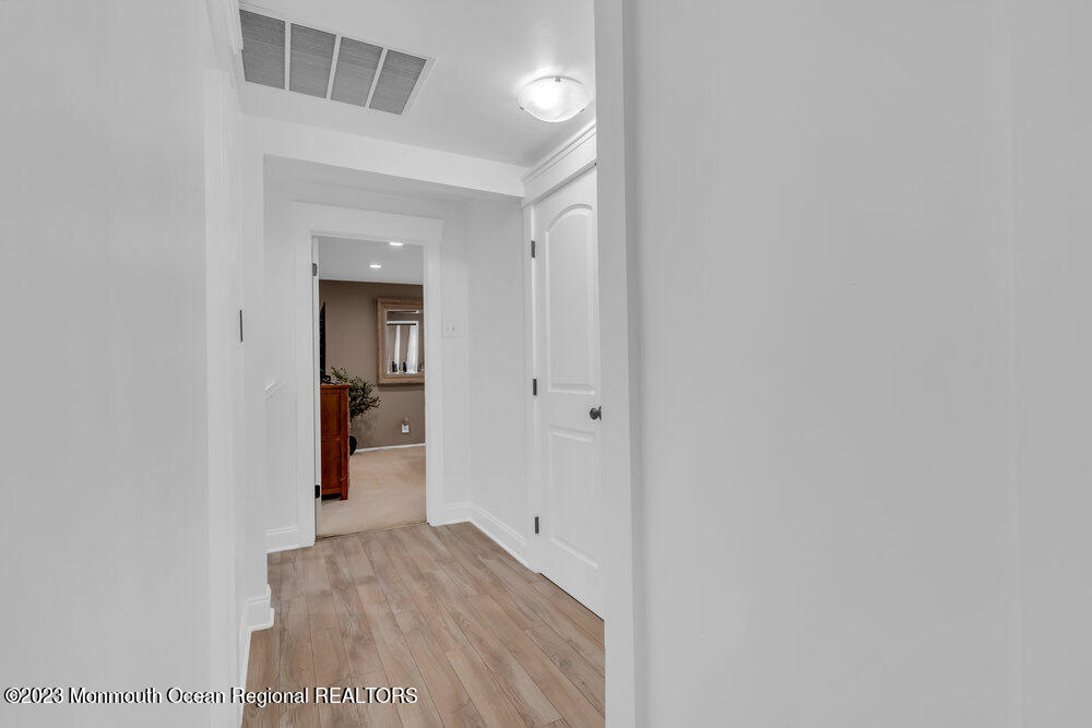 8 Hillside Road Manalapan, NJ 07726 - Photo 38 of 59 a view of a room with wooden floor and closet