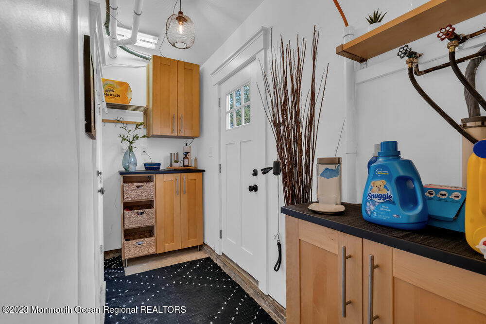 8 Hillside Road Manalapan, NJ 07726 - Photo 46 of 59 a kitchen with stainless steel appliances a refrigerator and a stove