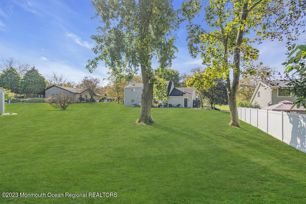 8 Hillside Road Manalapan, NJ 07726 - Photo 50 of 59 a view of a park with large trees