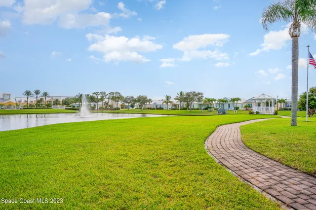 a view of a lake with a big yard
