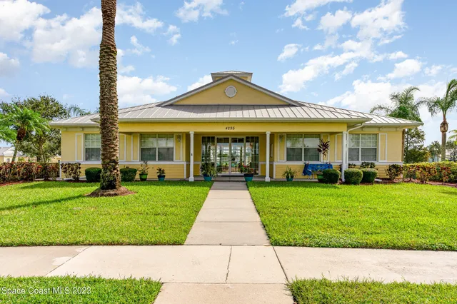 a front view of a house with yard
