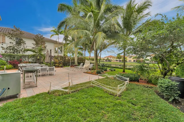 a view of a park with houses