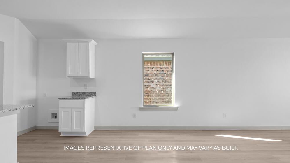 7331 9th Street Lubbock, TX 79416 - Photo 4 of 13 a view of kitchen and utility room