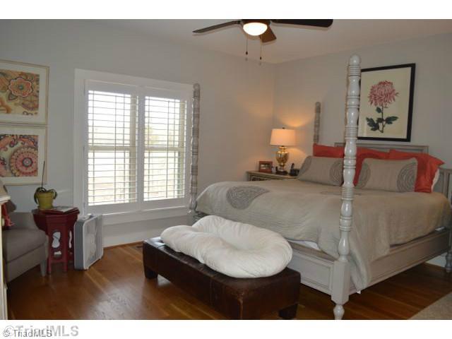 Master Bedroom. Hardwood floors, custom 3 in wood shutters