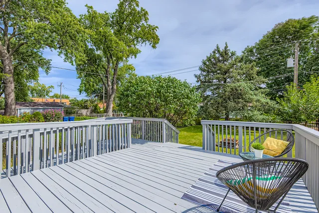 a backyard of a house with seating space