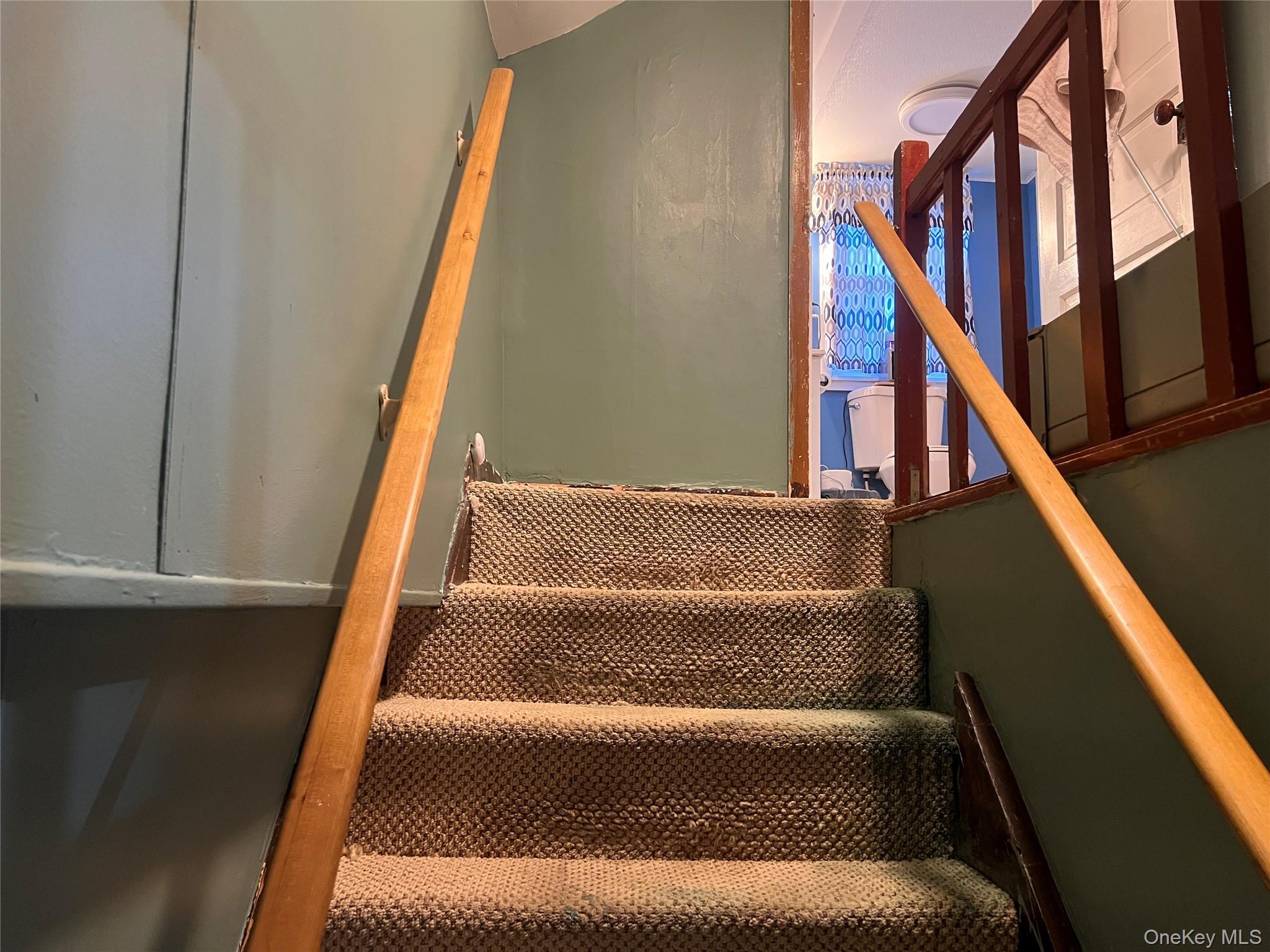 279 Cold Spring Road Monticello, NY 12701 - Photo 15 of 32 View of staircase