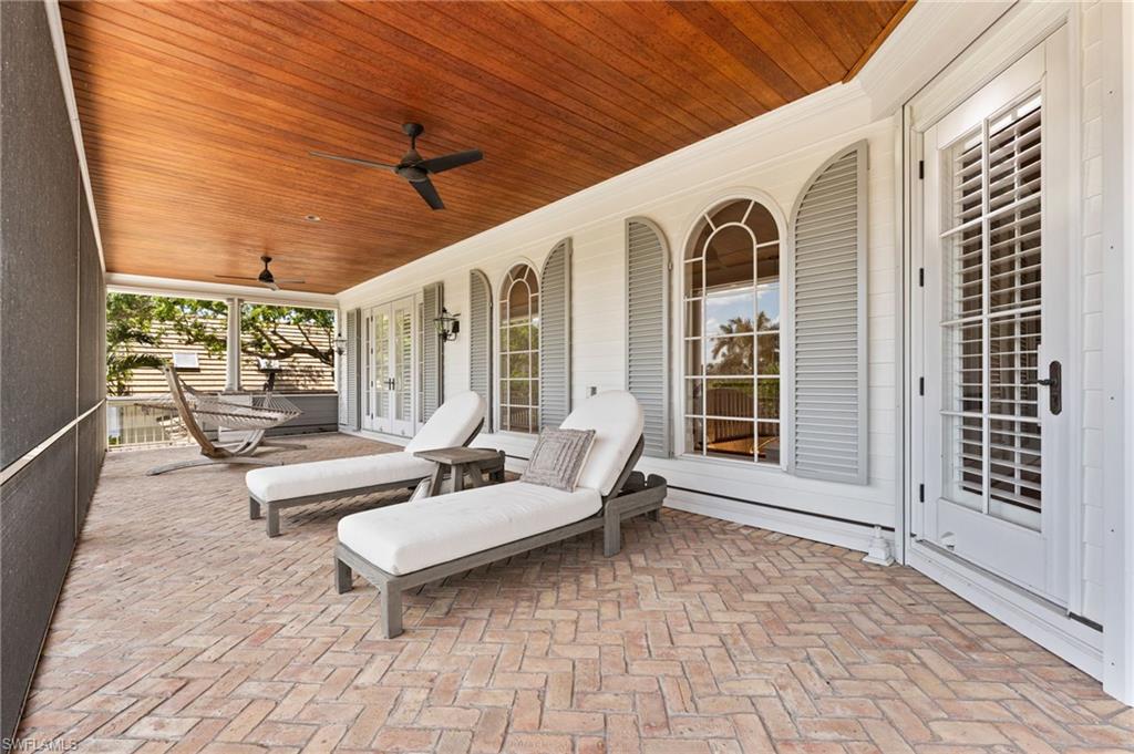 2325 Lantern Lane Naples, FL 34102 - Photo 38 of 50 View of patio / terrace with a ceiling fan and covered porch