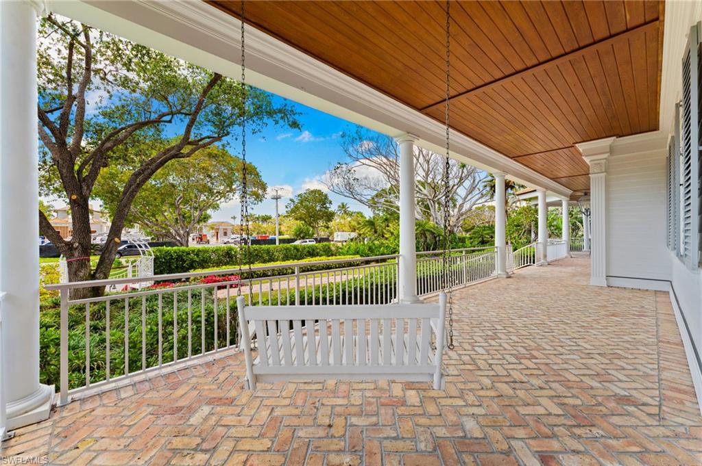2325 Lantern Lane Naples, FL 34102 - Photo 10 of 50 View of patio / terrace with covered porch