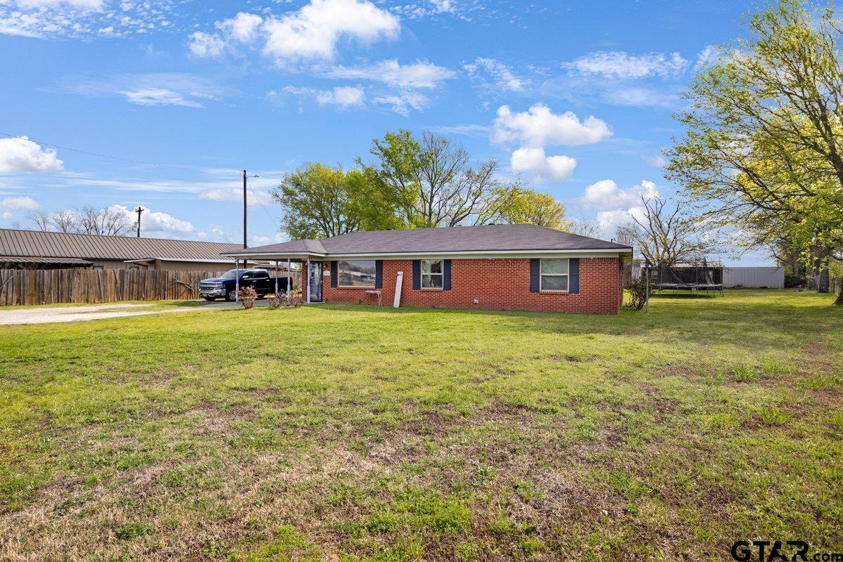 2954 Highway 322 Longview, TX 75603 - Photo 3 of 30 a view of a house with a yard