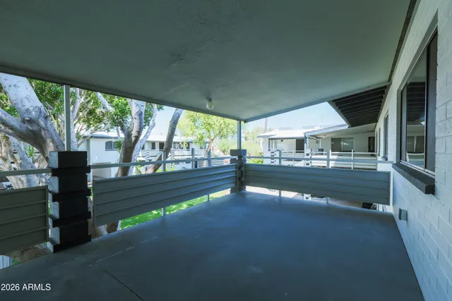 a view of swimming pool with outdoor seating