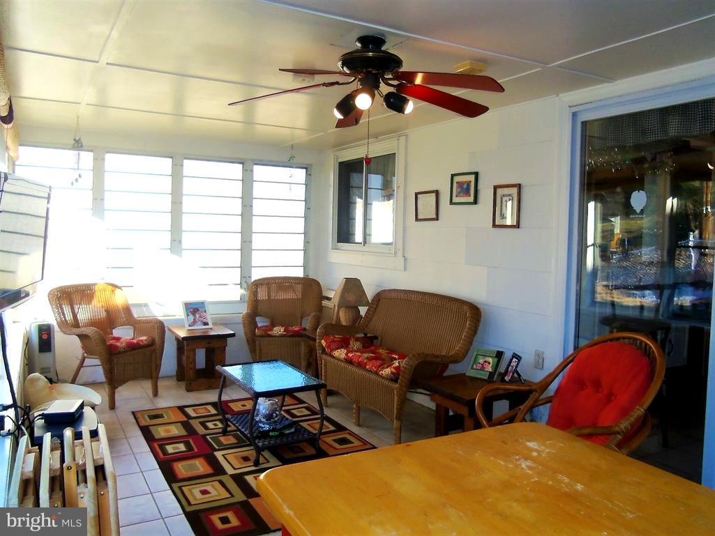 5730 Oakland Road Baltimore, MD 21227 - Photo 23 of 29 Enjoy this light-filled sunroom