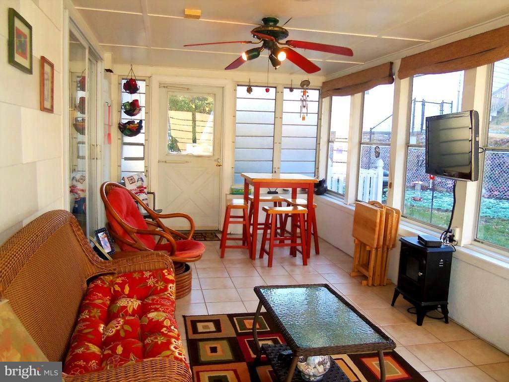 5730 Oakland Road Baltimore, MD 21227 - Photo 24 of 29 Sunroom