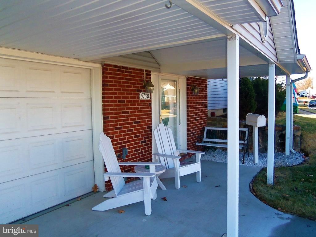 5730 Oakland Road Baltimore, MD 21227 - Photo 27 of 29 Concrete front porch!