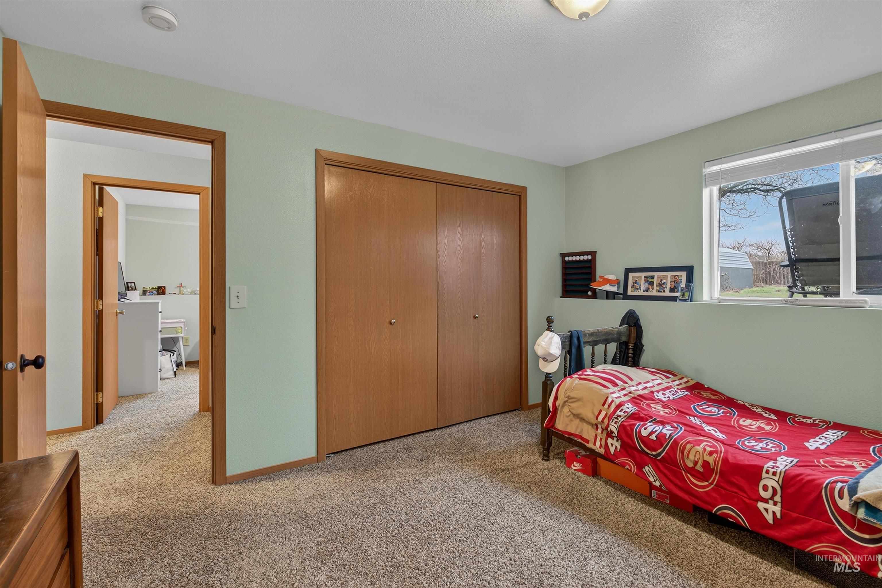 2814 22nd Street Clarkston, WA 99403 - Photo 27 of 33 Carpeted bedroom featuring a closet and baseboards