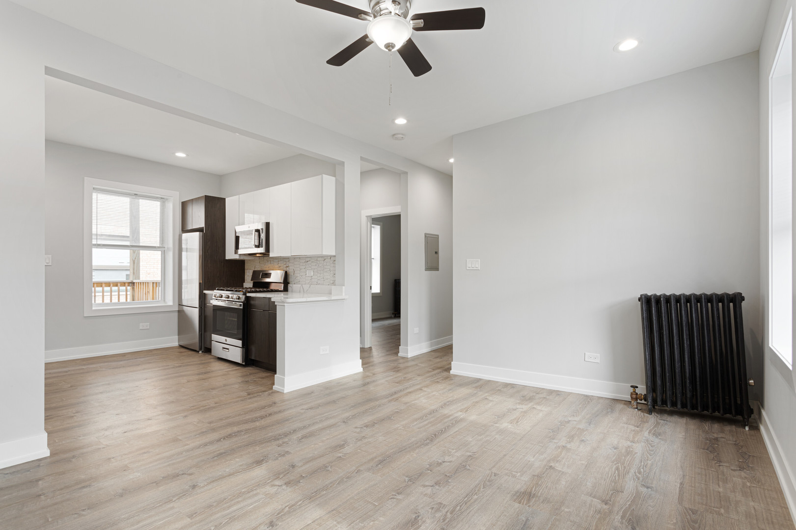 7425 North Clark Street, Unit 3 Chicago, IL 60626 - Photo 2 of 15 a view of kitchen with refrigerator and window