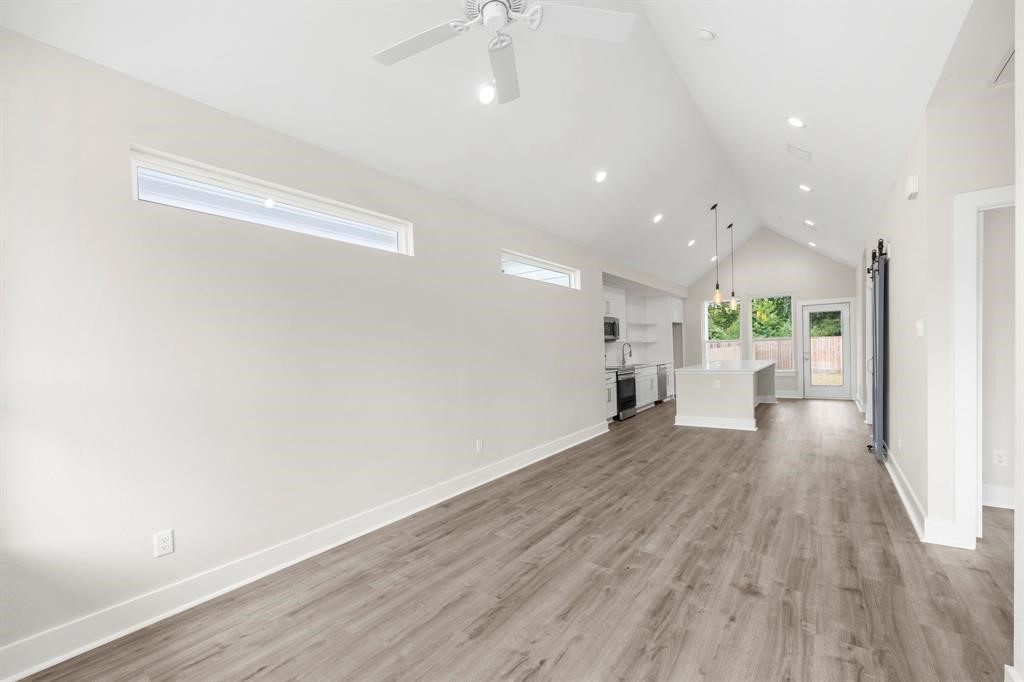 6832 Morrow Street, Unit A Houston, TX 77091 - Photo 12 of 16 a view of a living room with wooden floor