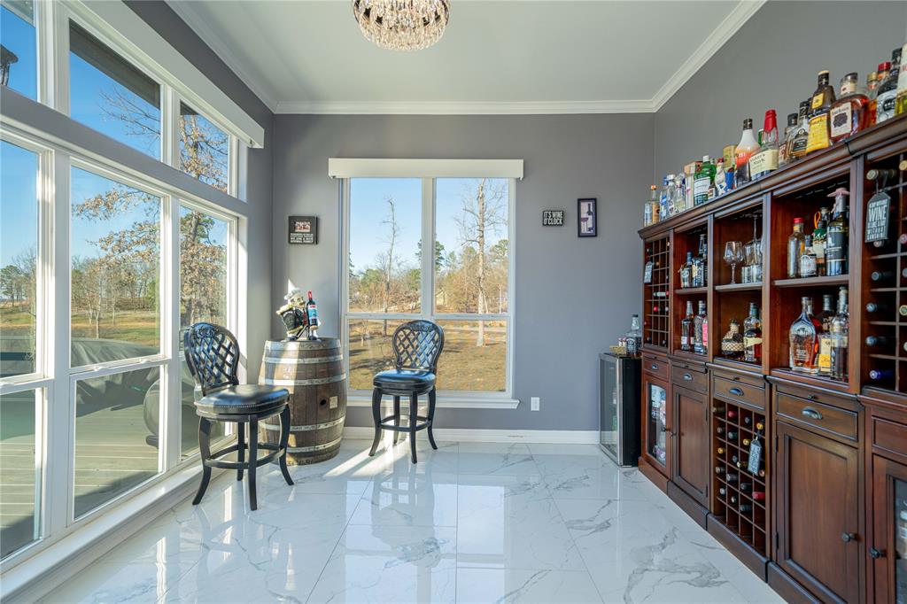 145 County Road Pittsburg, TX 75686 - Photo 14 of 39 a view of a livingroom with furniture window and outside view