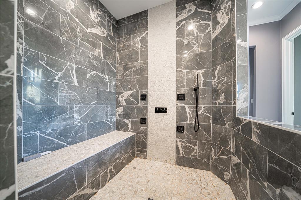 145 County Road Pittsburg, TX 75686 - Photo 20 of 39 a bathroom with a bathtub and shower