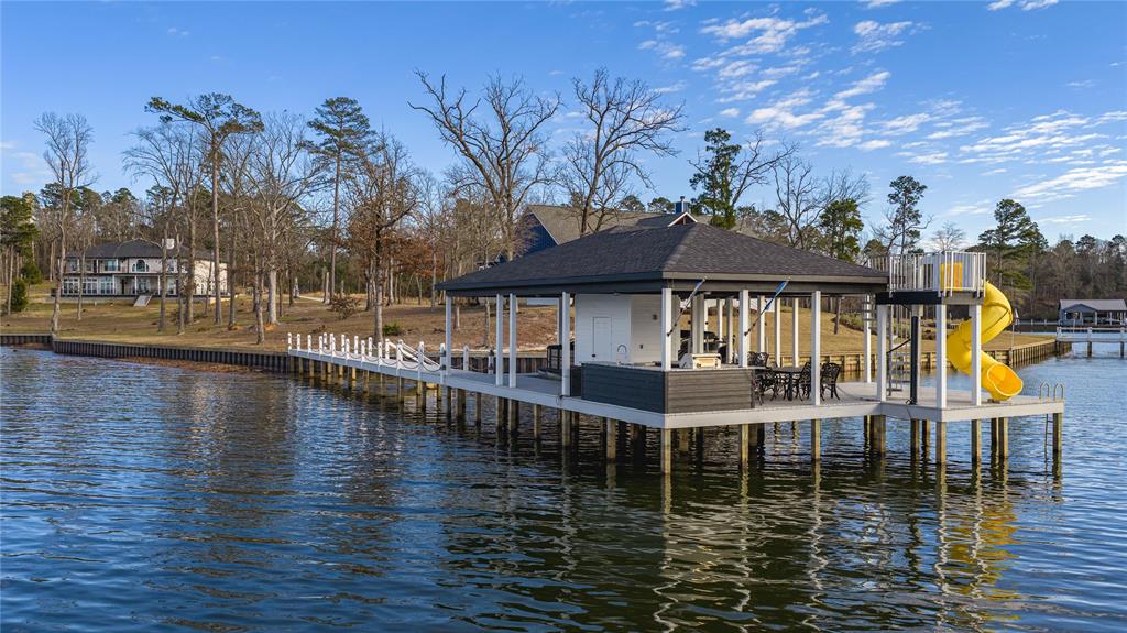 145 County Road Pittsburg, TX 75686 - Photo 35 of 39 a house with swimming pool in front of it