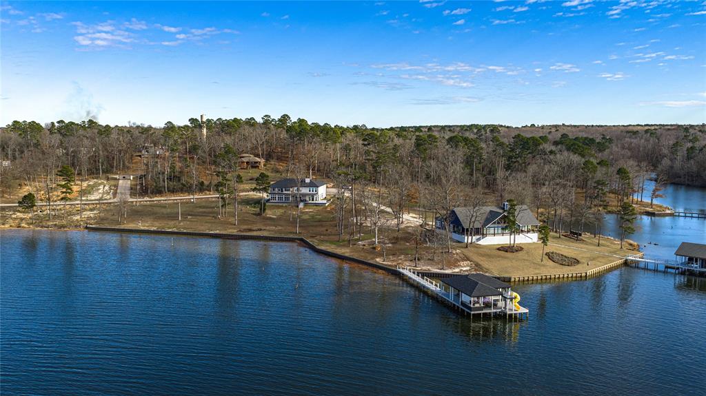 145 County Road Pittsburg, TX 75686 - Photo 39 of 39 a view of a lake with furniture