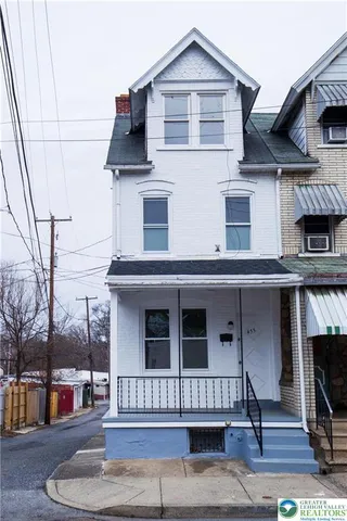 a view of a house with a patio