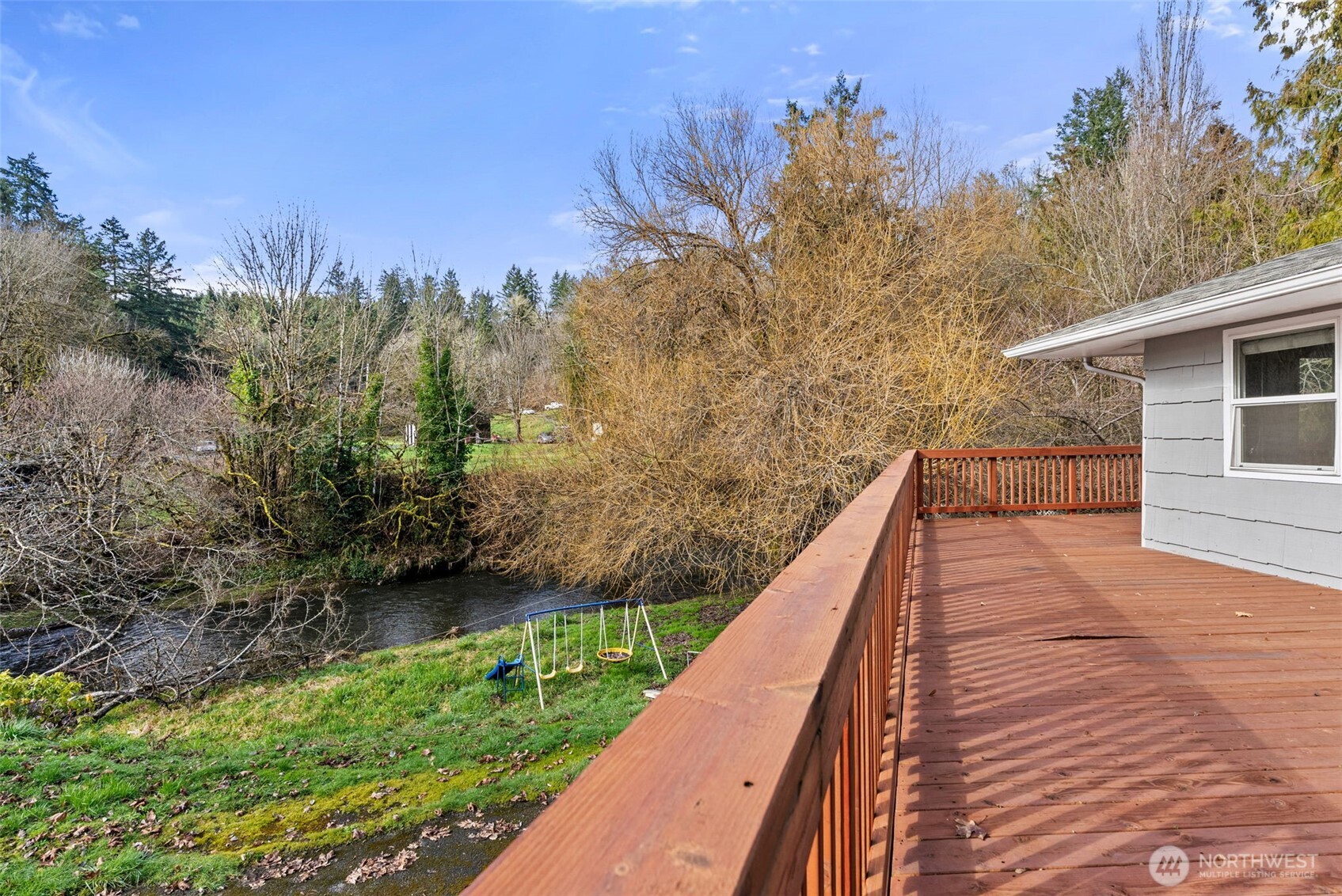 418 Southwest Canyon Loop Winlock, WA 98596 - Photo 26 of 35 a view of balcony with yard and trees in the background