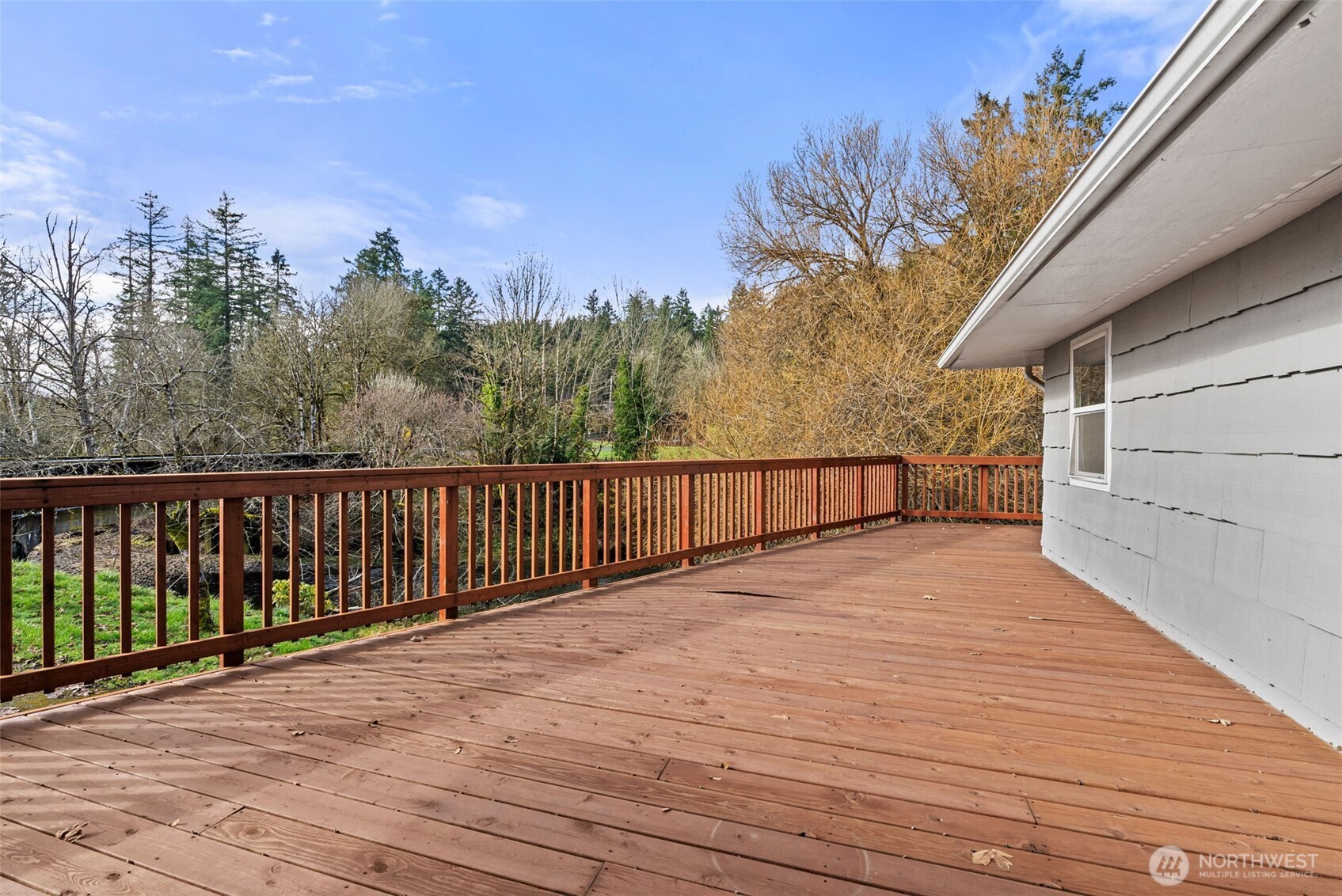418 Southwest Canyon Loop Winlock, WA 98596 - Photo 33 of 35 a view of balcony with wooden floor and fence