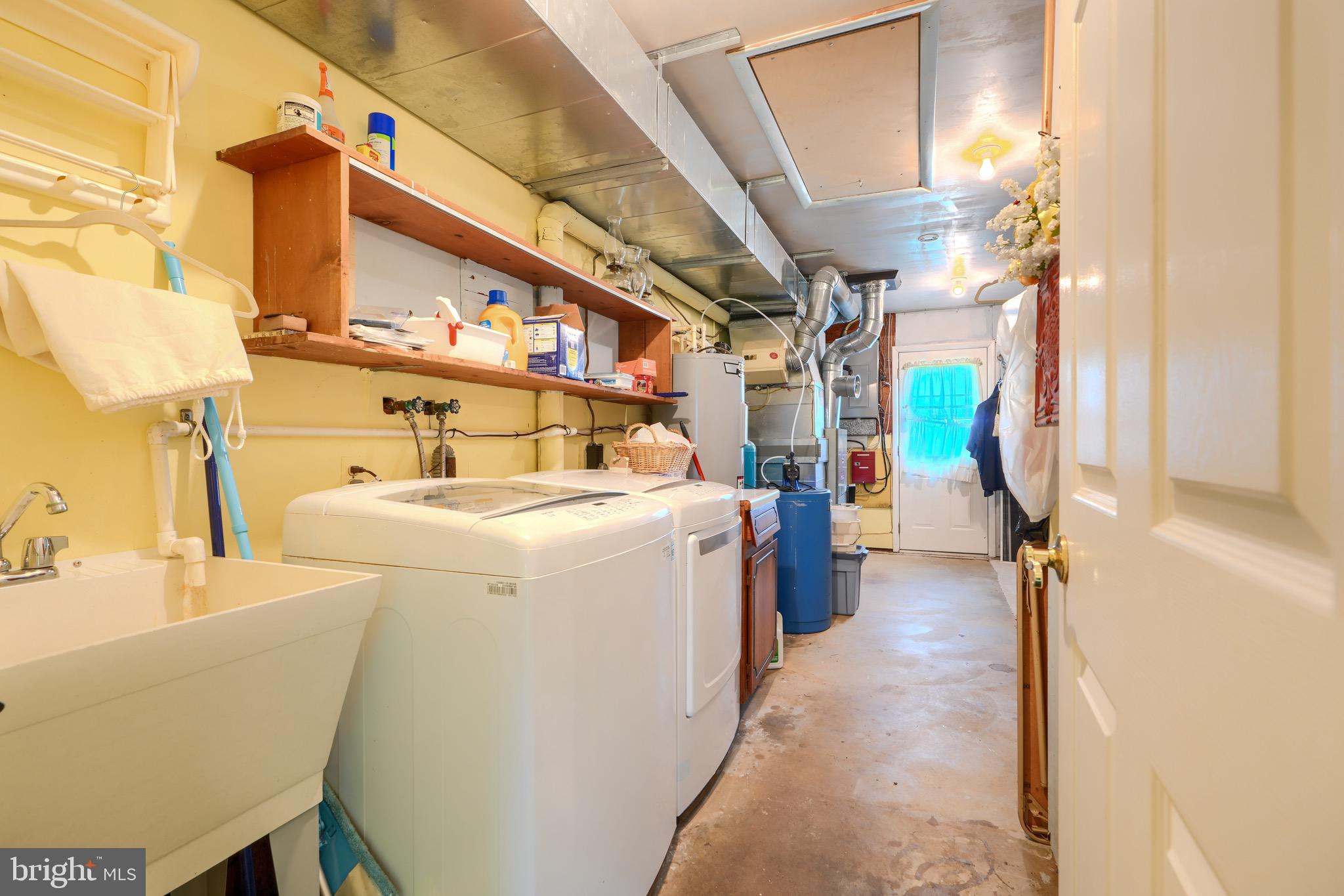 15009 La Vale Road Monkton, MD 21111 - Photo 40 of 45 Large laundry room with storage and attic access
