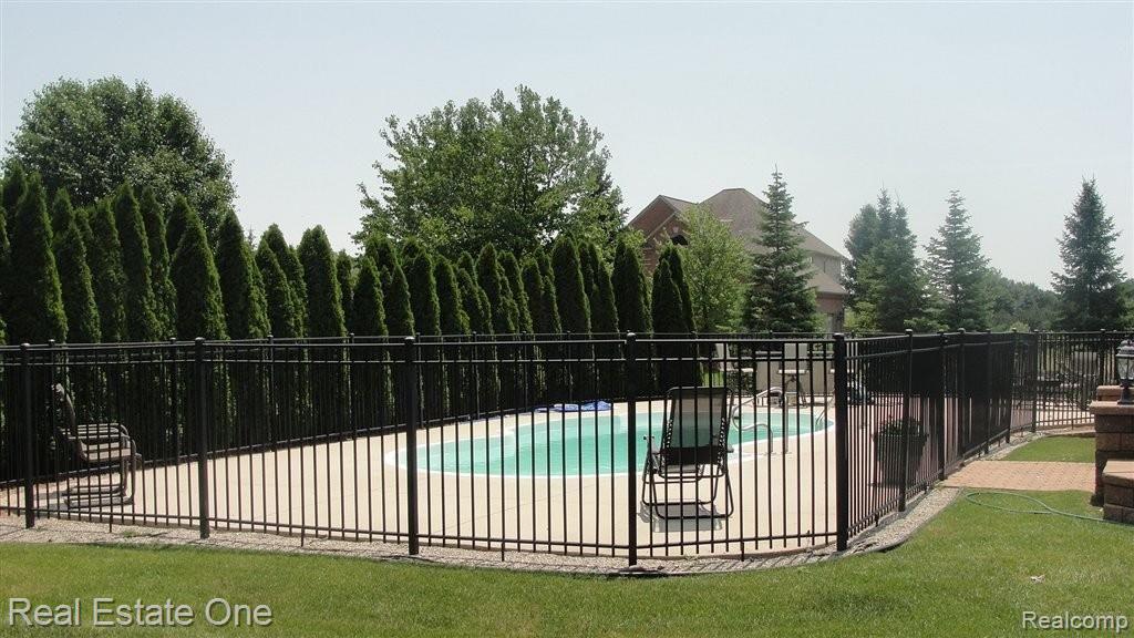 4545 Woodcliff Court Rochester, MI 48306 - Photo 24 of 25 Fenced Pool