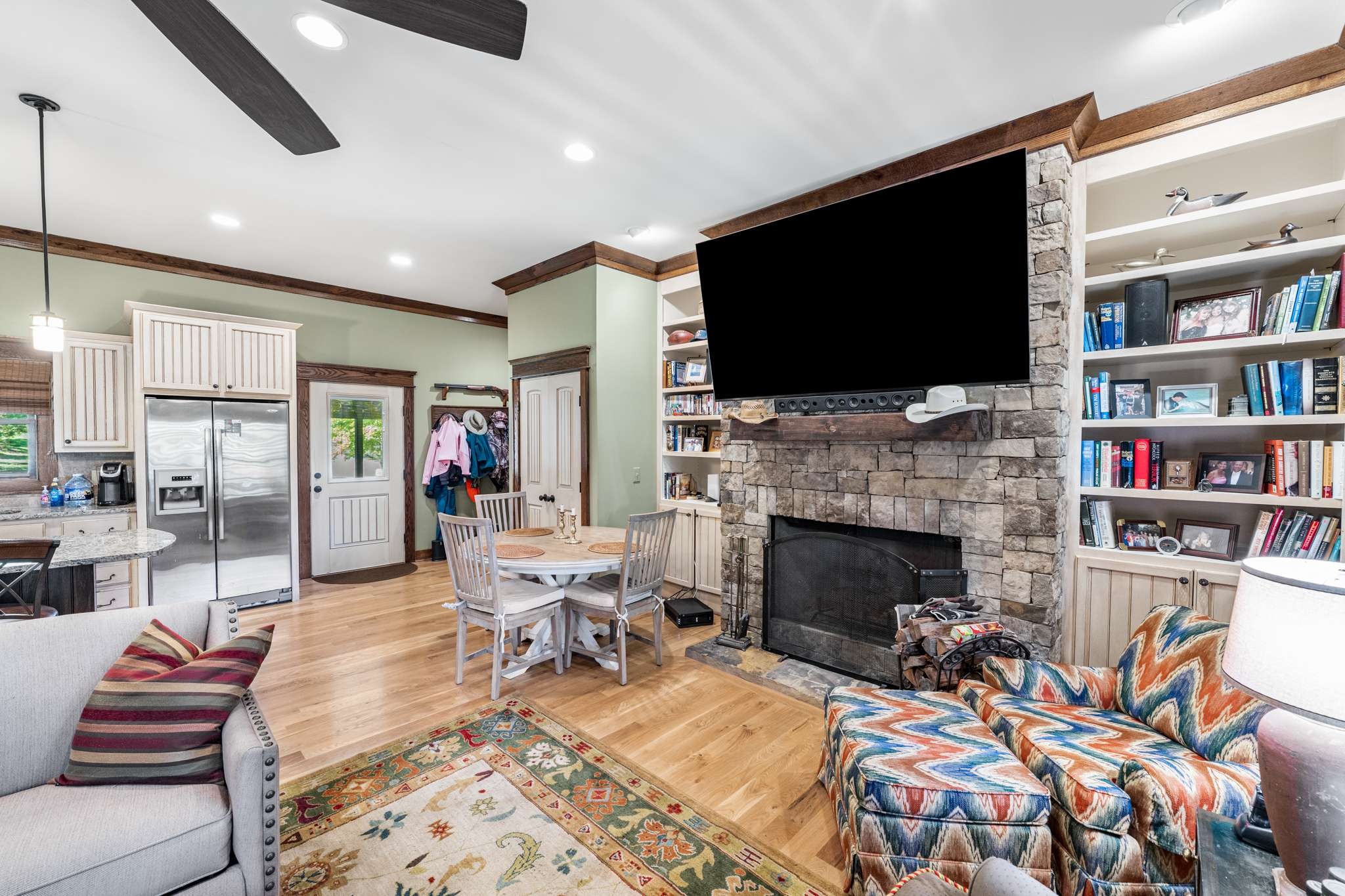 1257 Harris Hollow Road Charlotte, TN 37036 - Photo 12 of 53 a living room with fireplace furniture and a flat screen tv