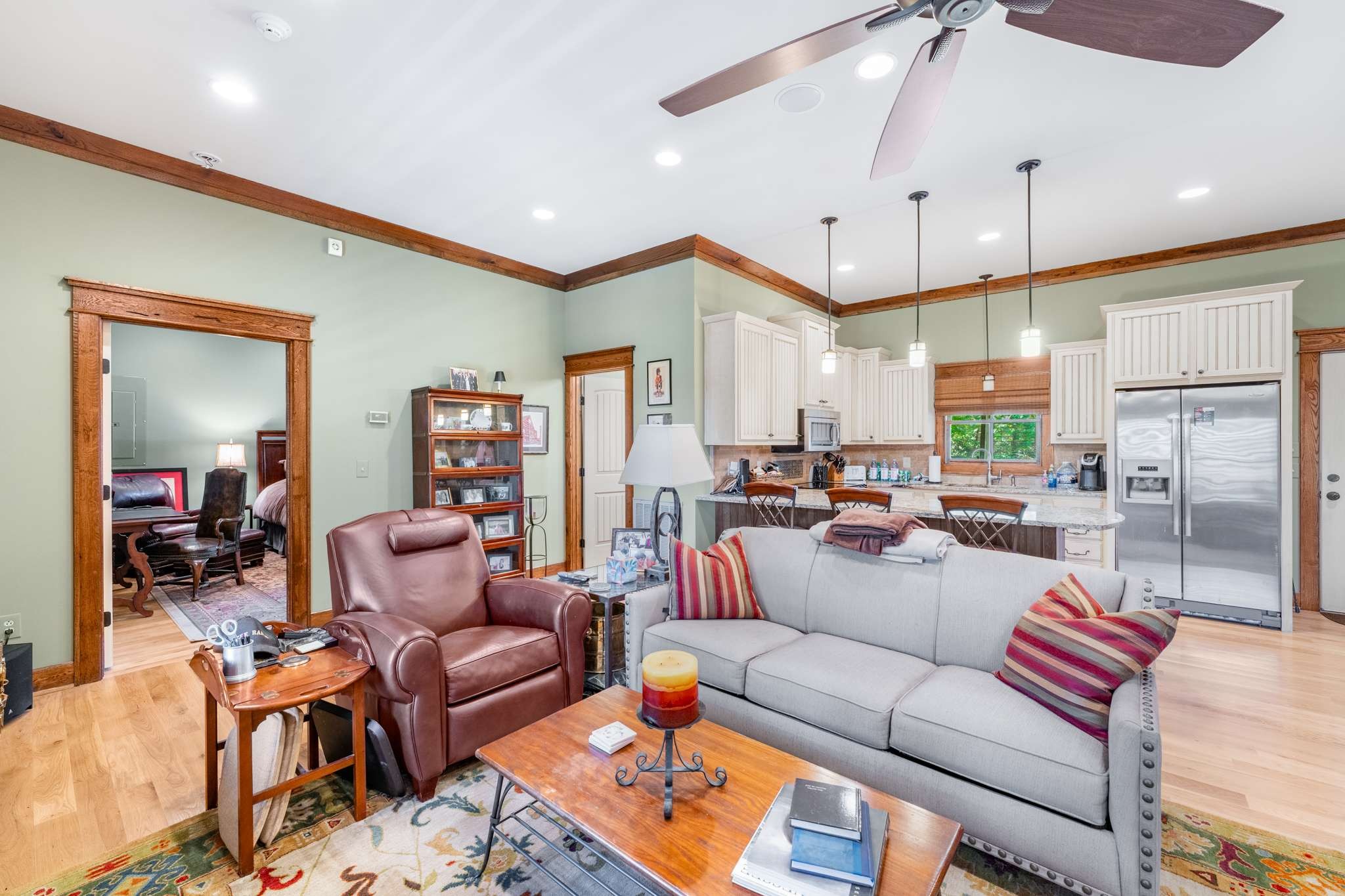 1257 Harris Hollow Road Charlotte, TN 37036 - Photo 16 of 53 a living room with furniture kitchen view and a chandelier