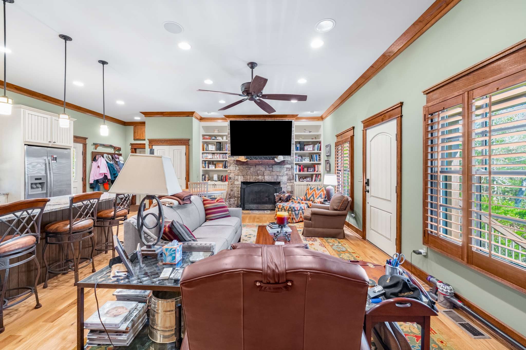 1257 Harris Hollow Road Charlotte, TN 37036 - Photo 18 of 53 a living room with furniture fireplace and flat screen tv