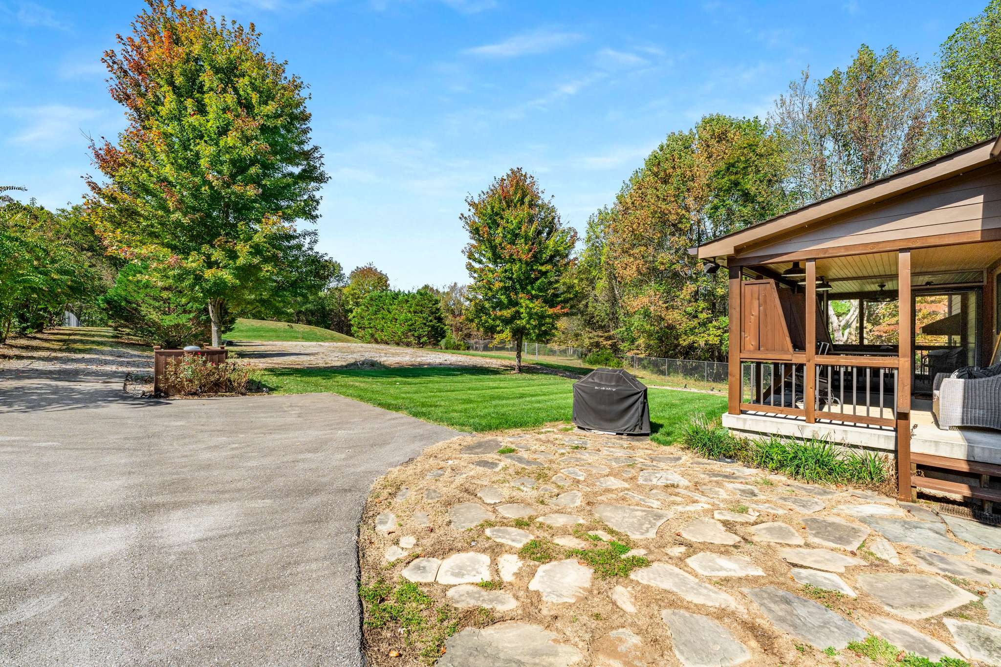1257 Harris Hollow Road Charlotte, TN 37036 - Photo 30 of 53 a view of a backyard with sitting area