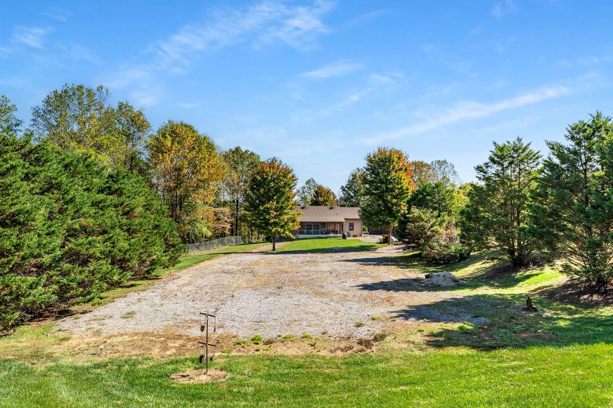 1257 Harris Hollow Road Charlotte, TN 37036 - Photo 34 of 53 a view of a yard with plants and trees