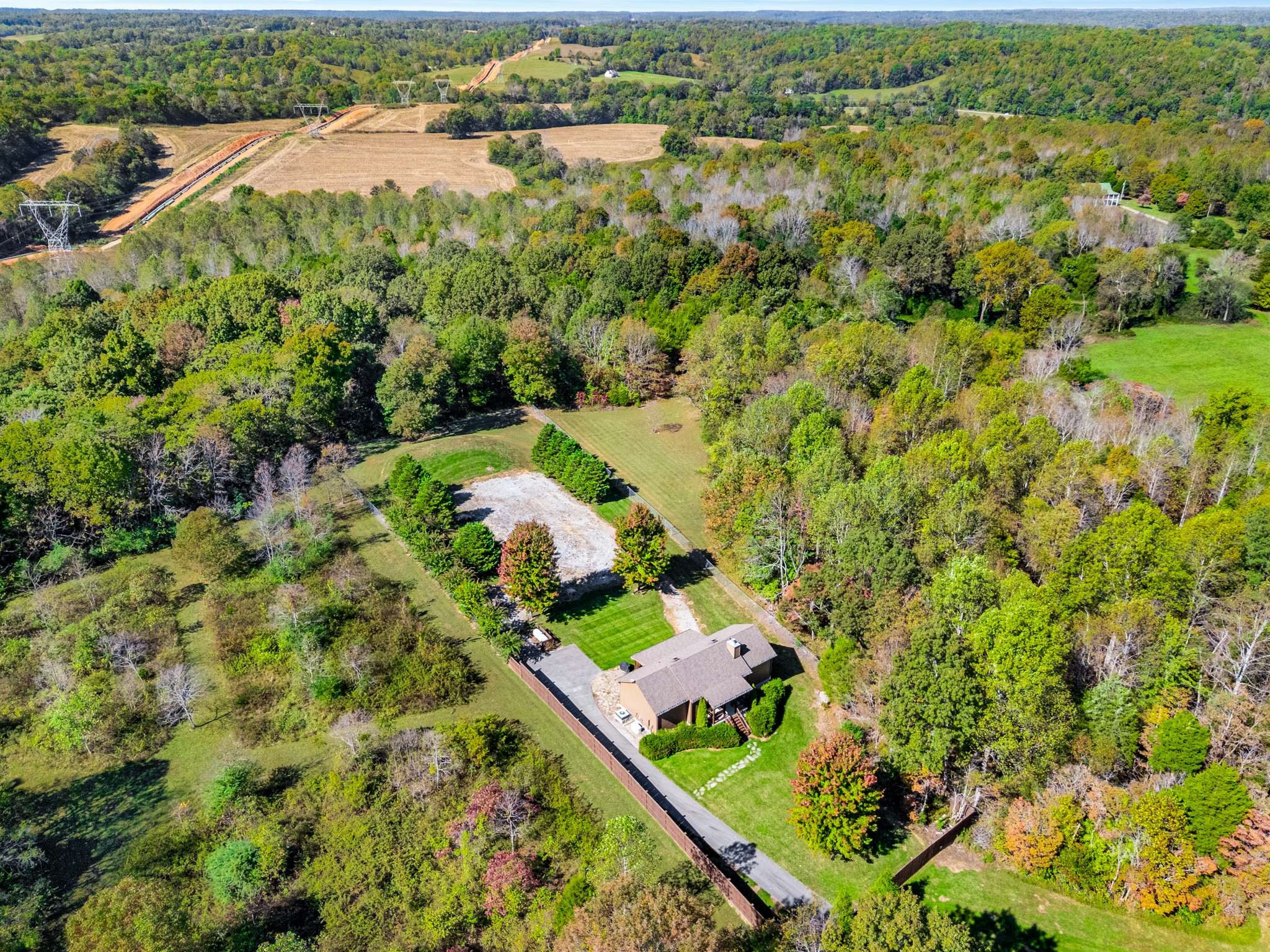 1257 Harris Hollow Road Charlotte, TN 37036 - Photo 49 of 53 an aerial view of a house with a yard and lake view